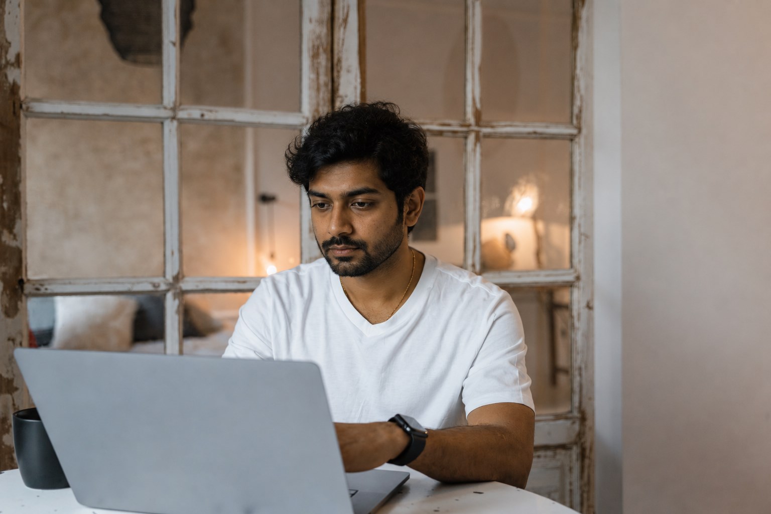 Professional reflecting on business ideas at a desk